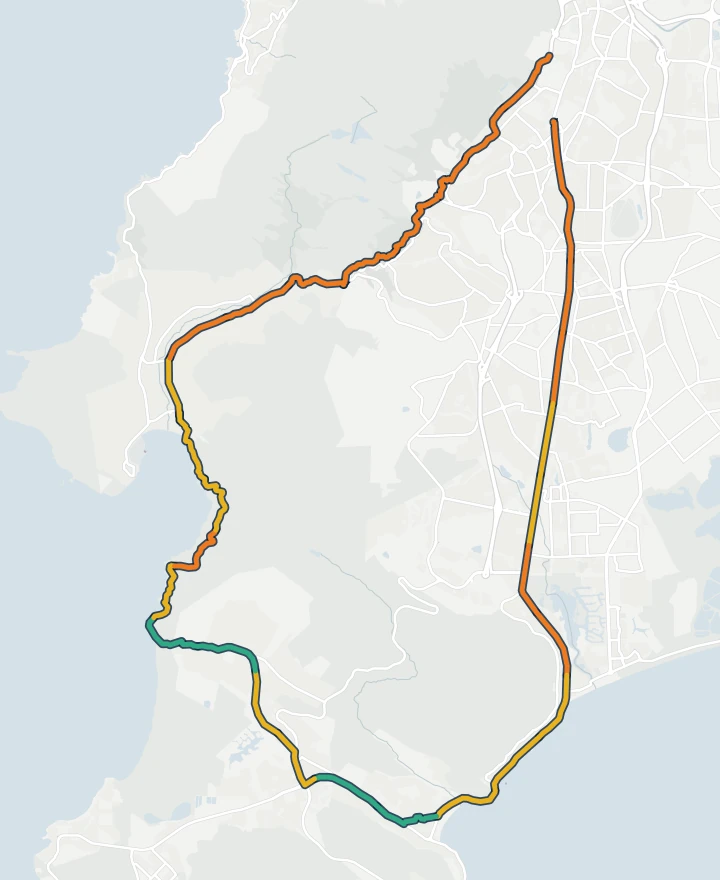 Map of the Two Oceans Ultra Marathon course from Newlands down Main Road to Muizenberg and Fish Hoek, over Chapman's Peak to Hout Bay and back over Constantia Nek to UCT, each stretch coloured by how hard the weather usually made it for a 6:42 per km runner.