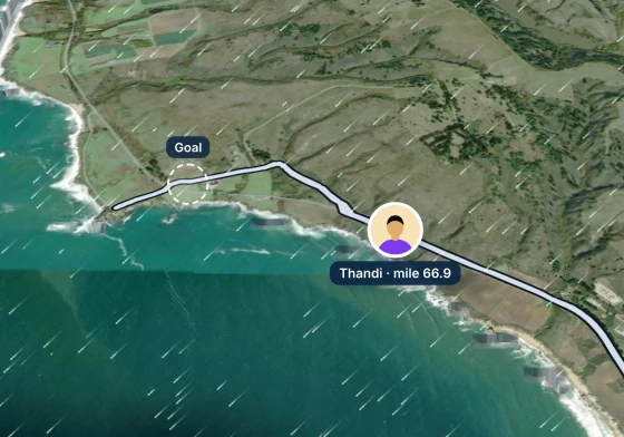 Windline’s live map: a rider’s pin, and the dashed Goal ring on the road.
